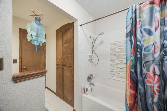 bathroom with shower / bathtub combination with curtain and a textured ceiling