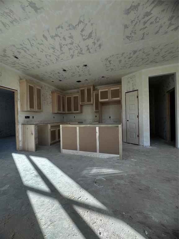 kitchen featuring light brown cabinets