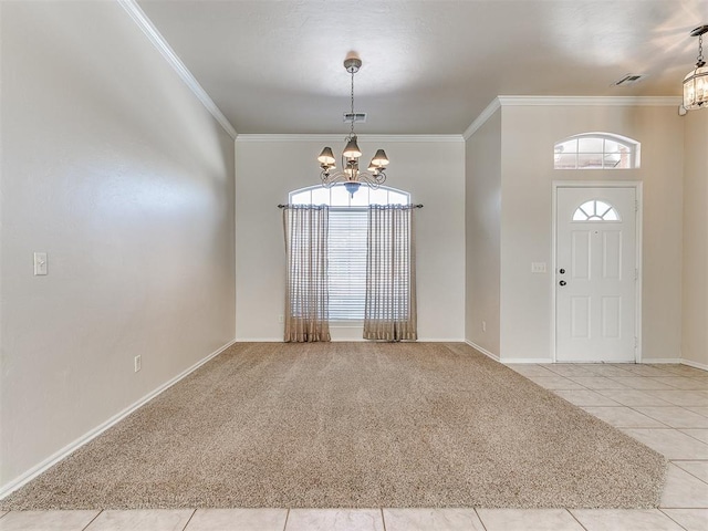 entrance foyer featuring light carpet, a wealth of natural light, and an inviting chandelier