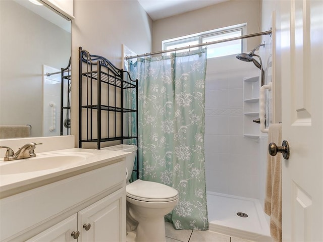 bathroom with toilet, a stall shower, tile patterned floors, and vanity