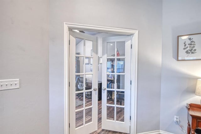 entryway featuring french doors and wood finished floors