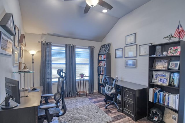 office with lofted ceiling, dark wood-style floors, and a ceiling fan