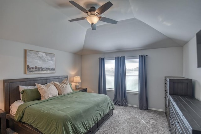 bedroom featuring lofted ceiling, light colored carpet, ceiling fan, and baseboards