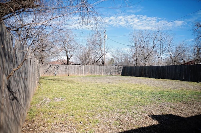 view of yard with fence