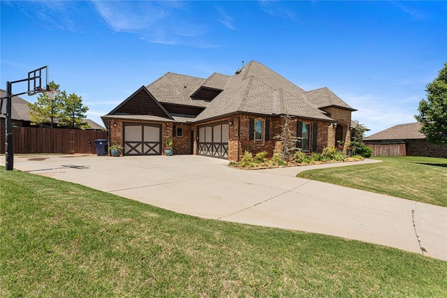 1525 NW 176th St, Edmond, OK 73012 - view of front of house featuring brick siding, a garage, driveway, and roof with shingles