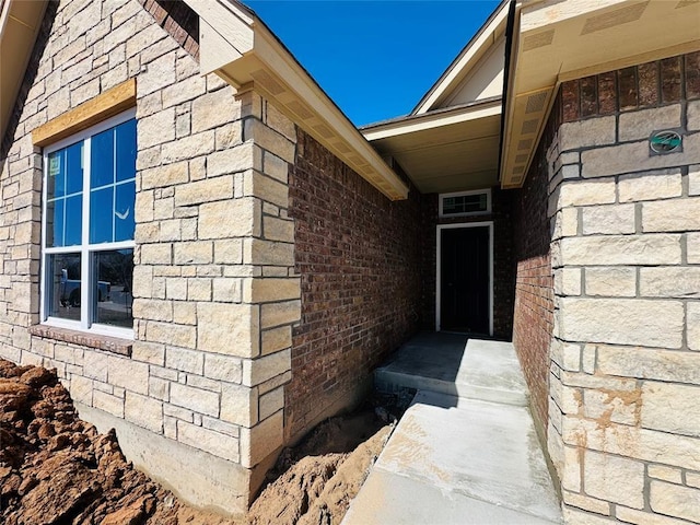 view of home's exterior with brick siding