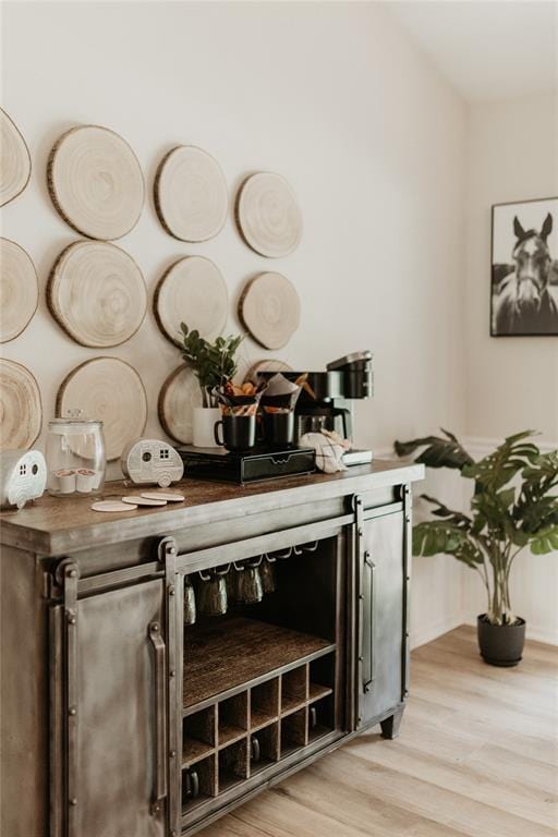 bar featuring light wood finished floors