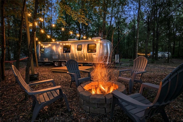 view of patio / terrace with a fire pit