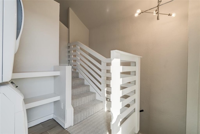 staircase with wood finished floors