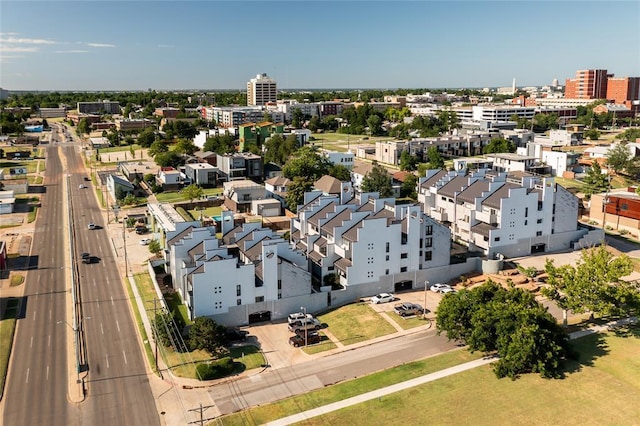 birds eye view of property with a residential view