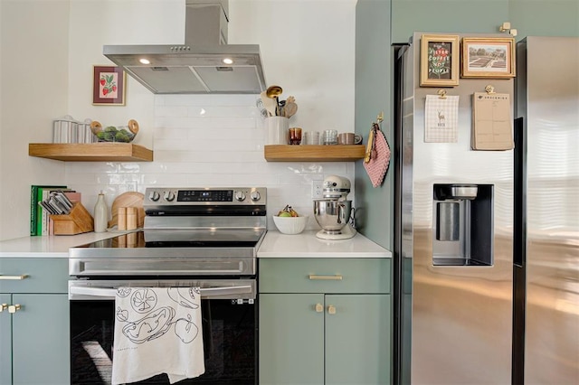 kitchen featuring range hood, open shelves, stainless steel appliances, light countertops, and decorative backsplash