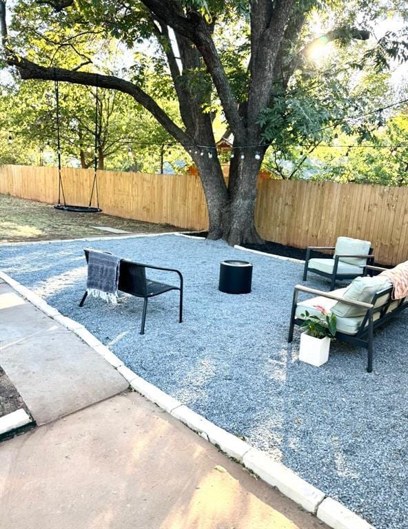 view of patio / terrace with fence