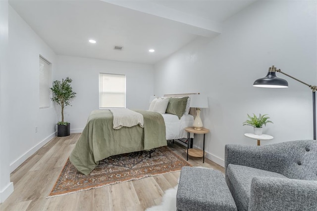 bedroom featuring recessed lighting, visible vents, baseboards, and wood finished floors