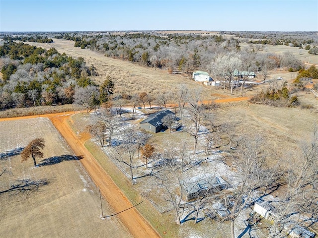 birds eye view of property featuring a rural view