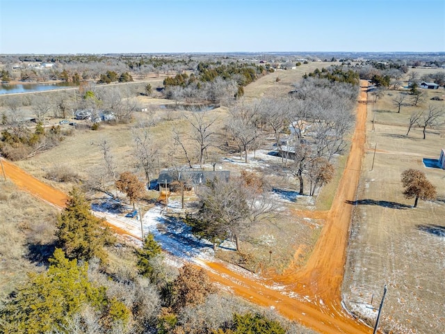 bird's eye view featuring a water view and a rural view