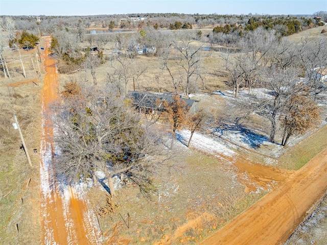 birds eye view of property featuring a rural view