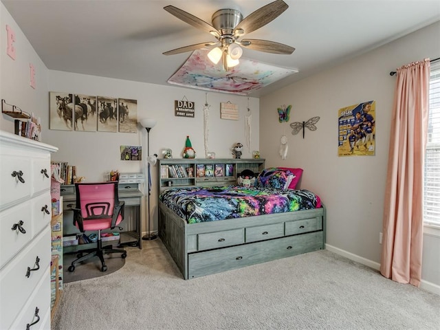 bedroom featuring carpet floors, baseboards, and a ceiling fan