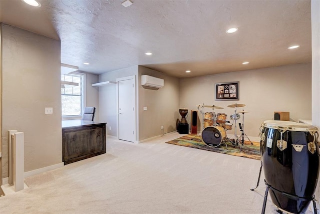 playroom with baseboards, light colored carpet, a textured ceiling, an AC wall unit, and recessed lighting