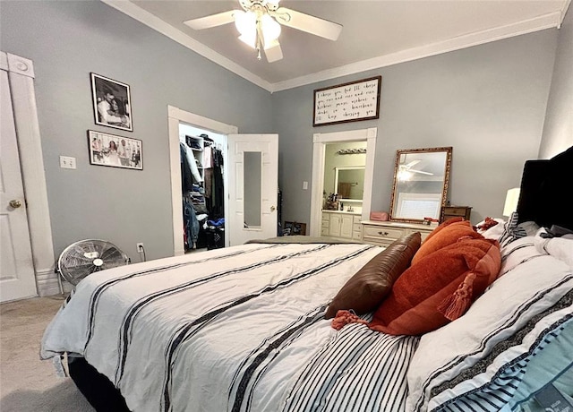 bedroom featuring ornamental molding, carpet flooring, connected bathroom, and a ceiling fan