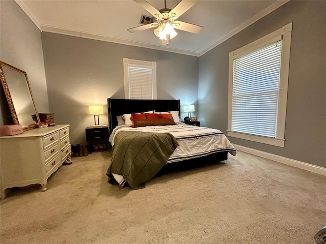 bedroom with light carpet, baseboards, ornamental molding, and a ceiling fan