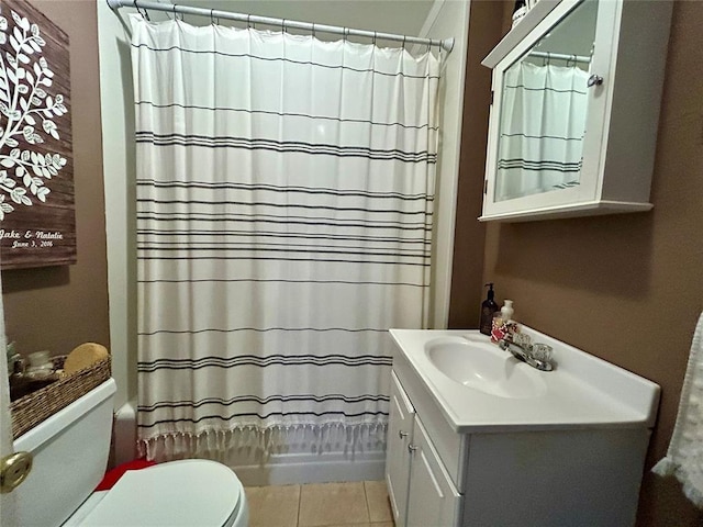 bathroom featuring toilet, tile patterned floors, vanity, and shower / bathtub combination with curtain