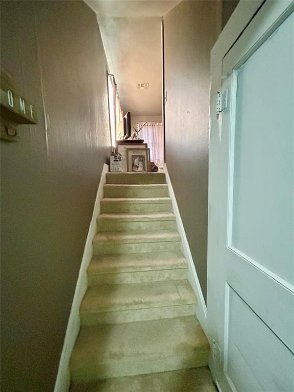 stairs with baseboards