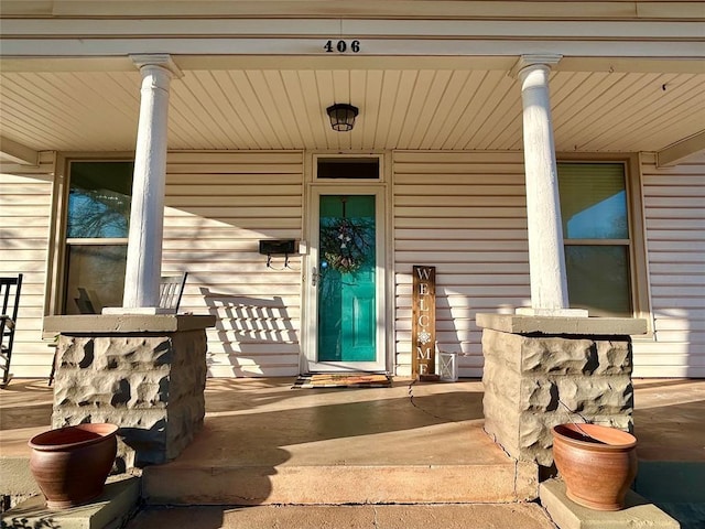 entrance to property with a porch