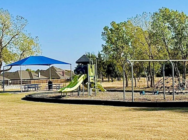 community playground featuring fence