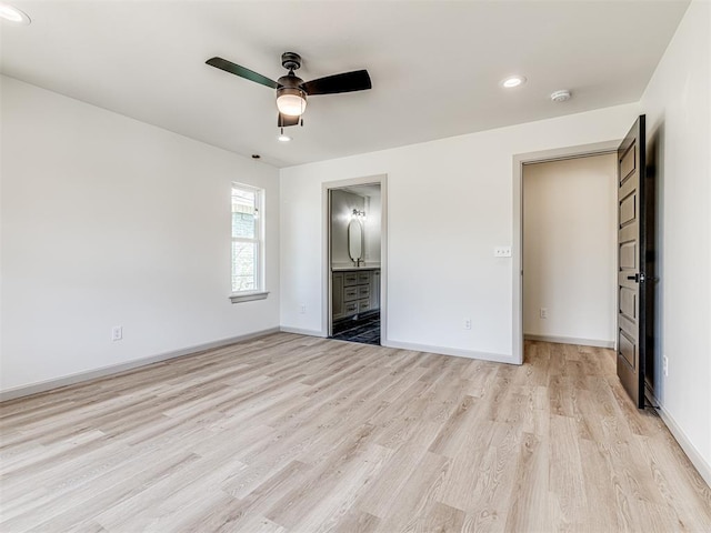 unfurnished bedroom featuring baseboards, a ceiling fan, light wood-style floors, recessed lighting, and connected bathroom