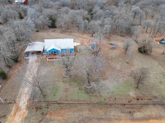 birds eye view of property with a rural view