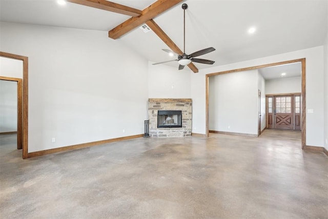 unfurnished living room featuring baseboards, vaulted ceiling with beams, finished concrete floors, a fireplace, and recessed lighting