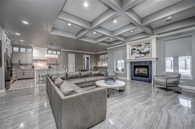 living room with baseboards, coffered ceiling, beam ceiling, recessed lighting, and a fireplace