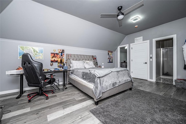 bedroom with wood finished floors, visible vents, baseboards, lofted ceiling, and ceiling fan