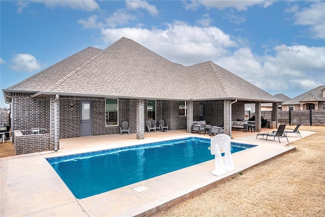 view of swimming pool featuring a fenced in pool, an outdoor living space, a patio, and fence