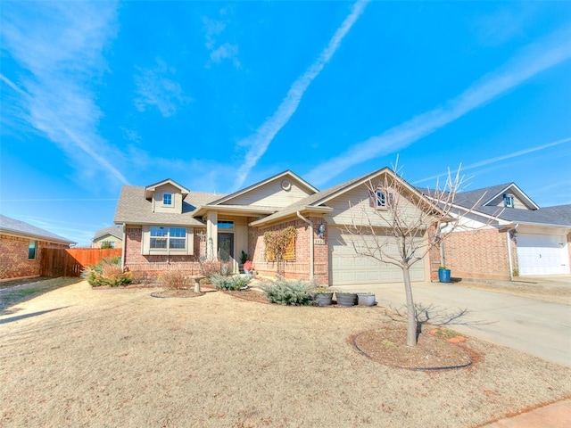 ranch-style home featuring a garage, concrete driveway, brick siding, and fence