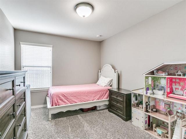 bedroom featuring carpet