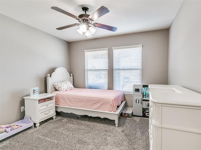 carpeted bedroom with a ceiling fan