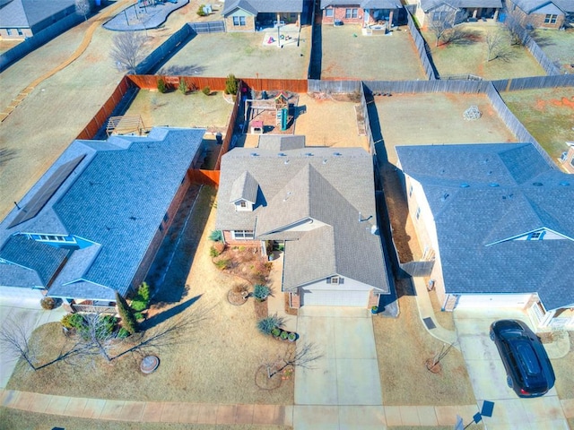 birds eye view of property with a residential view