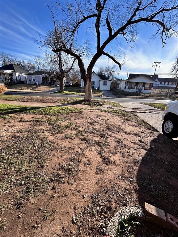 view of yard featuring a residential view