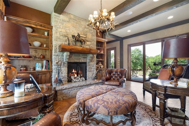 living room with an inviting chandelier, a fireplace, and beamed ceiling