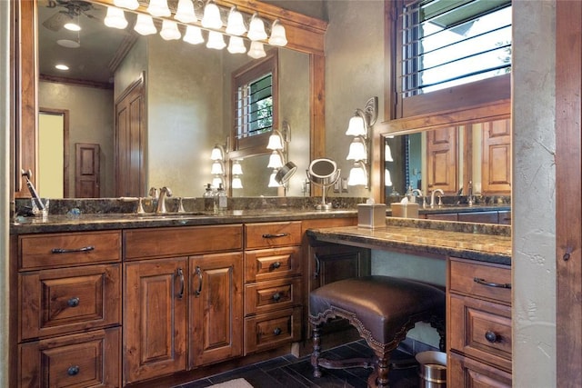 full bath featuring ornamental molding and vanity