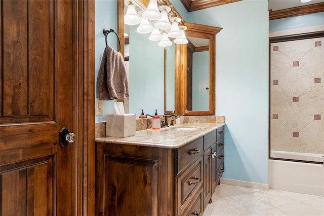 full bath with shower / bath combination with glass door, ornamental molding, vanity, tile patterned flooring, and baseboards