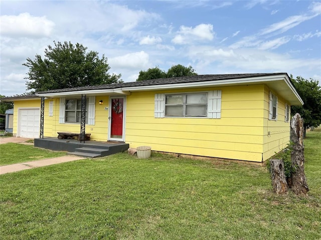 707 S Third St, Cheyenne, OK 73628 - view of front of house with a garage and a front lawn