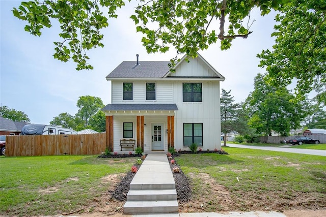 1027 S 7th St, Chickasha, OK 73018 - view of front of property with covered porch and a shingled roof