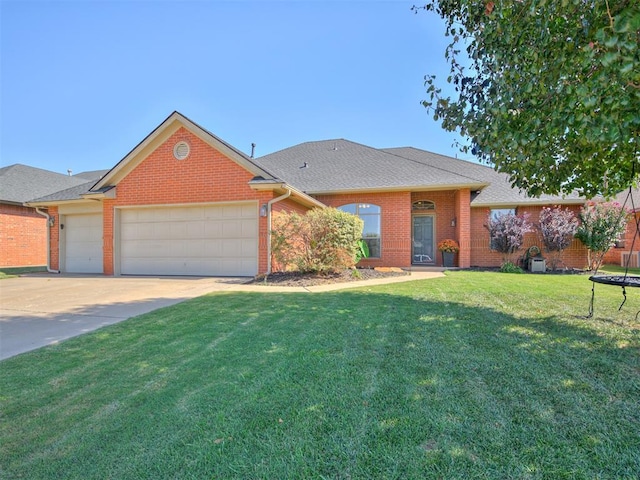 ranch-style home featuring a garage, driveway, brick siding, and a front lawn