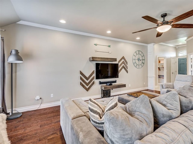 living room featuring baseboards, ornamental molding, dark wood-style flooring, and recessed lighting