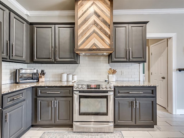 kitchen with ornamental molding, premium range hood, light stone countertops, and stainless steel range with electric cooktop