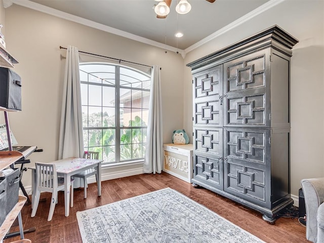 office area featuring dark wood finished floors, recessed lighting, ornamental molding, ceiling fan, and baseboards