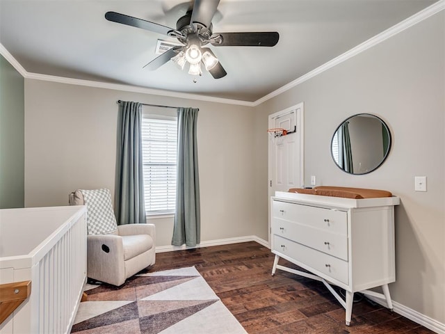 bedroom featuring dark wood-style floors, ceiling fan, baseboards, and crown molding