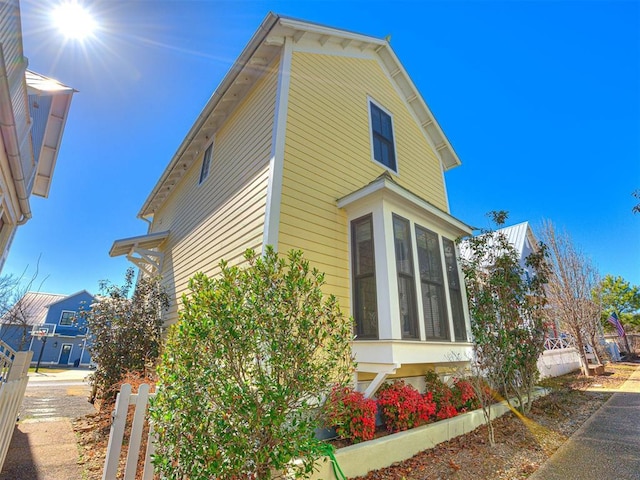 20 Redbud Ln Unit B, Carlton Landing, OK 74432 - view of side of home with a sunroom and fence